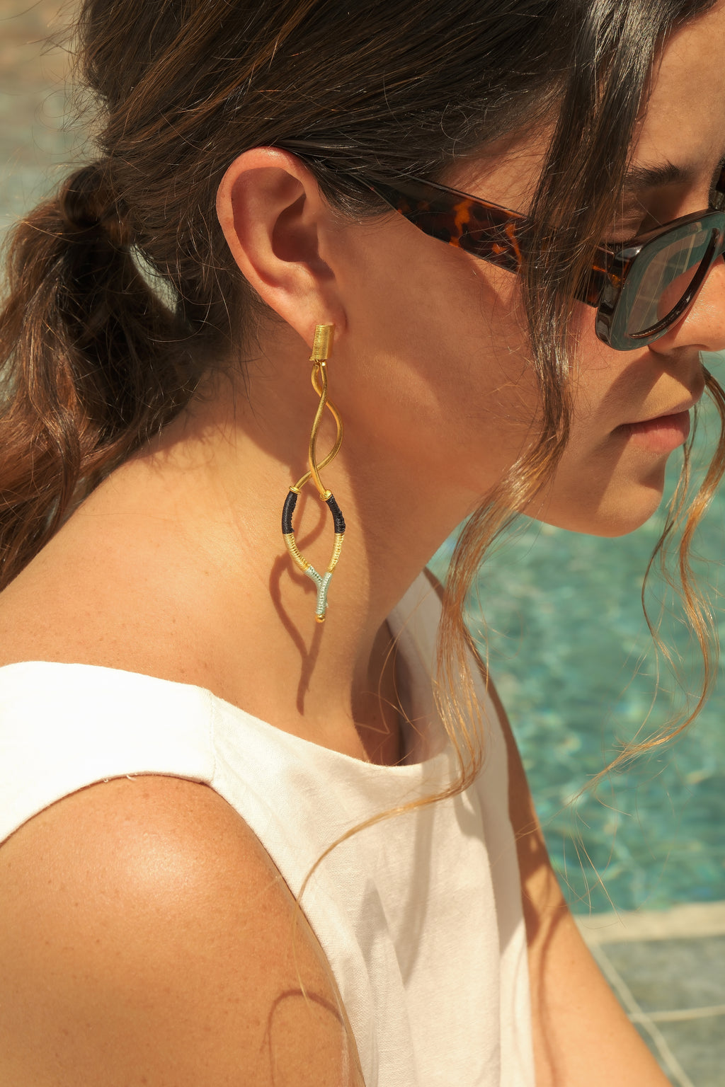 Aretes Olas encontradas